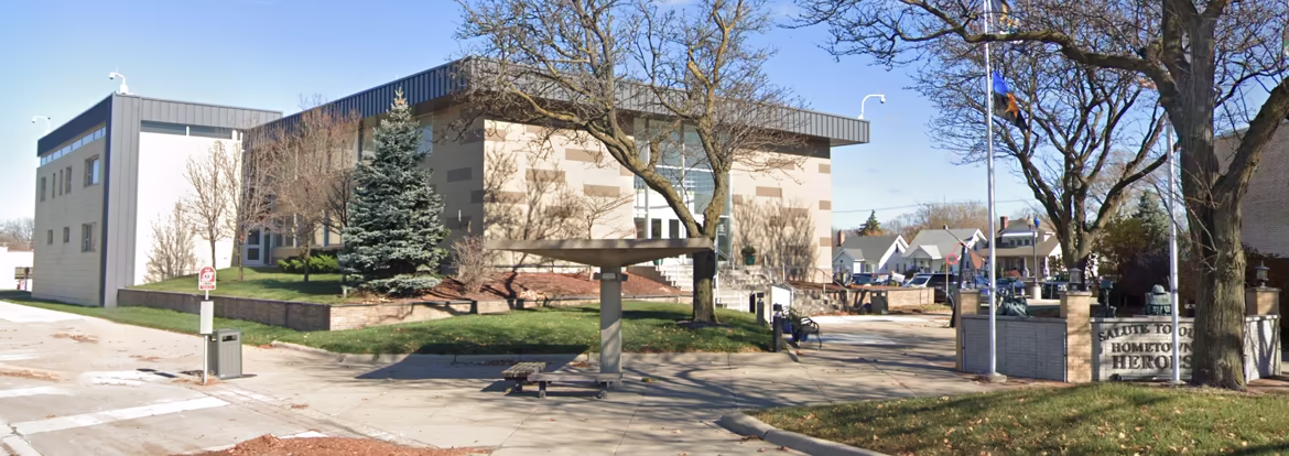 Front entrance of the 43rd District Court in Hazel Park. It's a brown and beige colored courthouse building